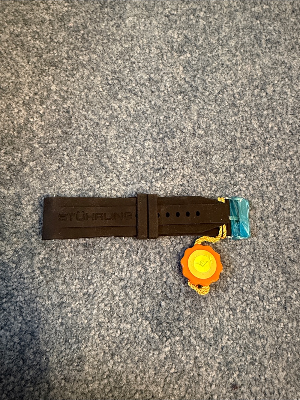 Stuhrling Original Black Silicone Watch Strap with Orange Tag and Yellow Cord